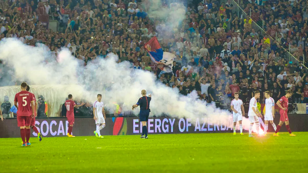 Serbia vs. Albania October 14, 2014. Fans threw flares onto the pitch.