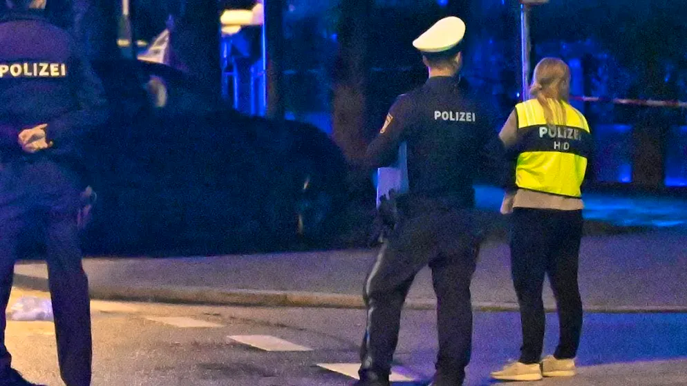 Police officers at the scene in Munich. Photo: Felix Hörhager/dpa