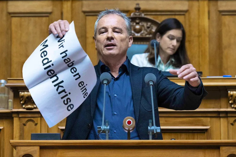 Members of parliament are allowed to read from A4 sheets of paper, but not show them to the camera.