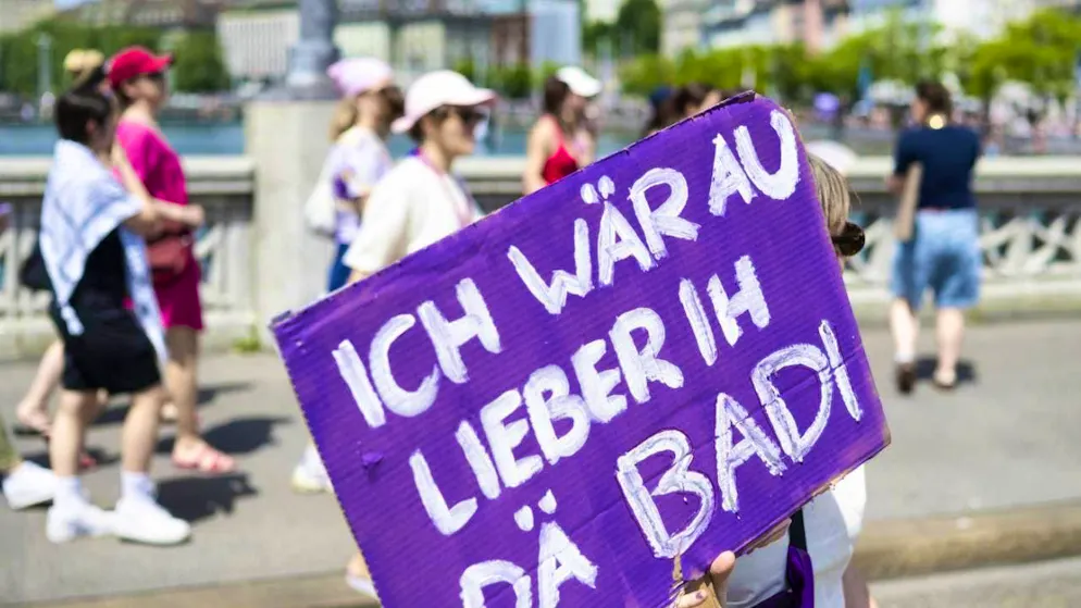 Instead of lying in the pool, this participant took part in the women's demonstration in Zurich along with an estimated ten thousand others.