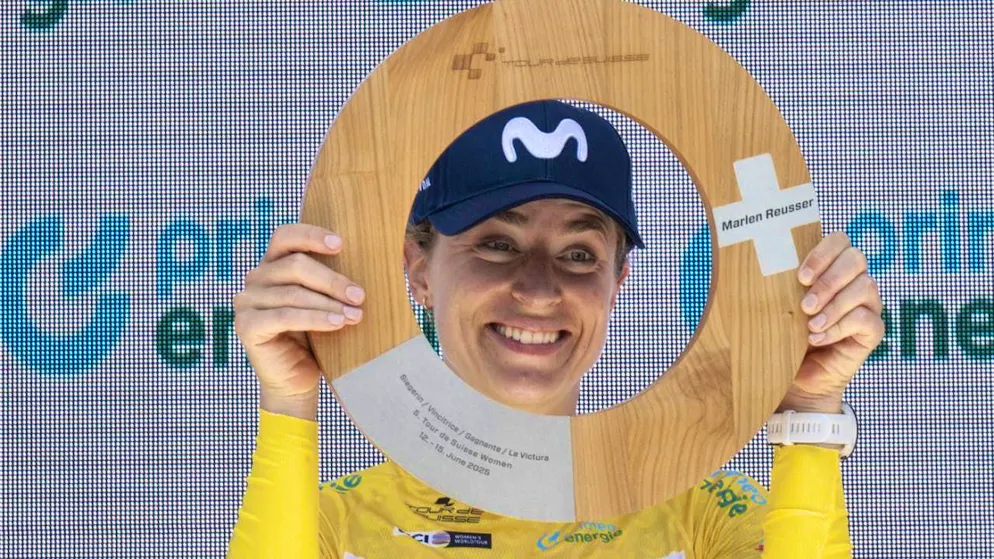 Marlen Reusser poses proudly with the overall winner's trophy.