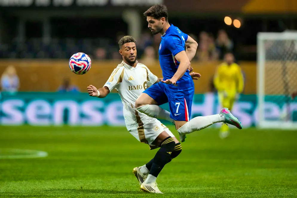 Chelsea's goalscorer Pedro Neto (r) in action.
