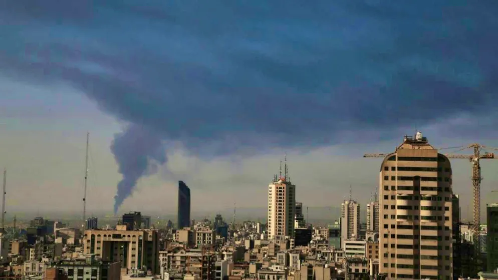 Enormous smoke rises from an oil facility in southern Tehran, Iran, after it was apparently hit by an Israeli attack on Saturday. Photo: Uncredited/AP/dpa