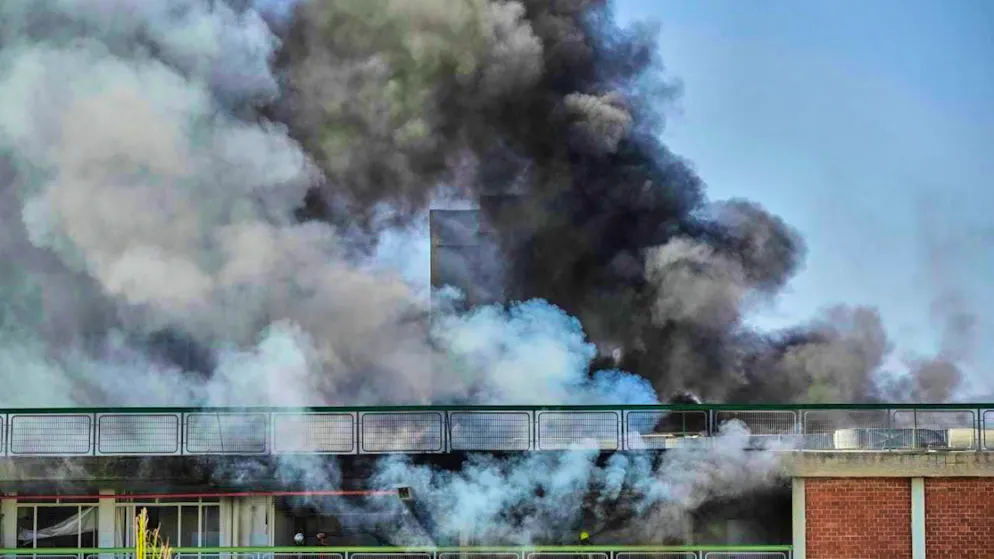 Firefighters work in a building of Soroka Hospital after it was hit by a missile fired from Iran. Photo: Leo Correa/AP/dpa
