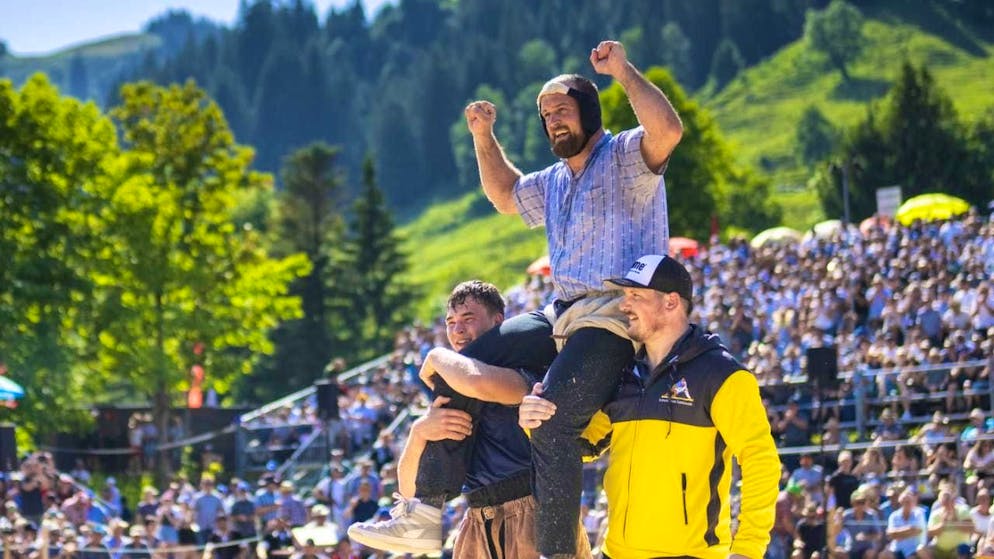Matthias Aeschbacher celebrates after his victory at Schwarzsee