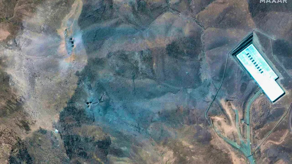 HANDOUT - This satellite image provided by Maxar Technologies shows a close-up of craters and ash on a hill at the Fordo enrichment facility in Iran after the U.S. attacks on June 22, 2025. Photo: Uncredited/Maxar Technologies via AP/dpa - ATTENTION: For editorial use only in connection with current reporting until July 6, 2025 and only with full credit given above
