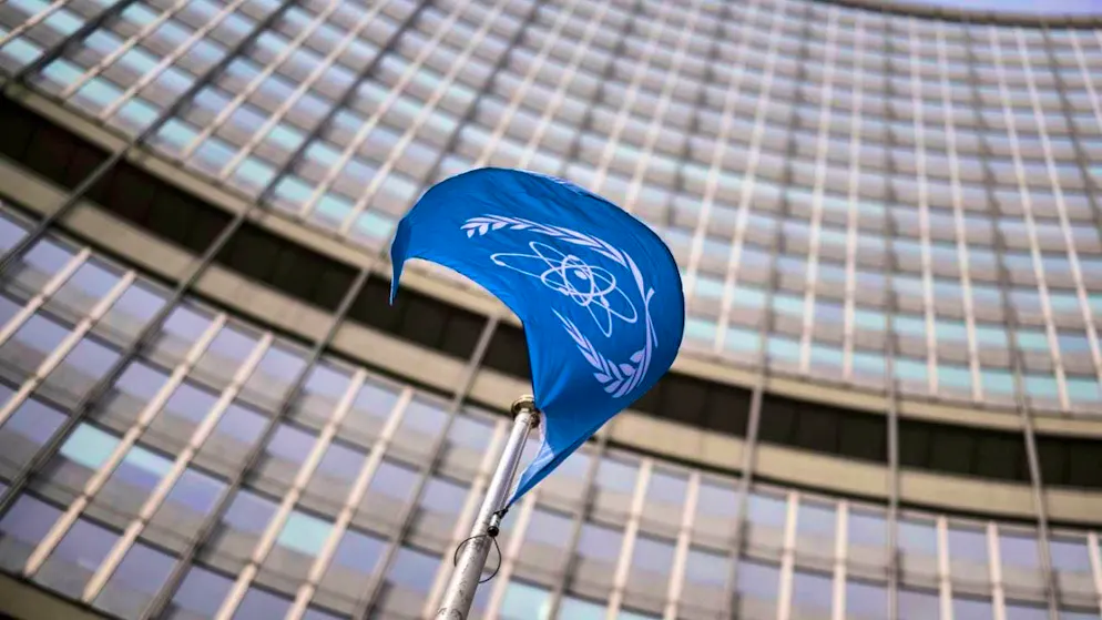 A flag flies in front of the International Atomic Energy Agency (IAEA) in Vienna. Photo: Michael Gruber/AP/dpa