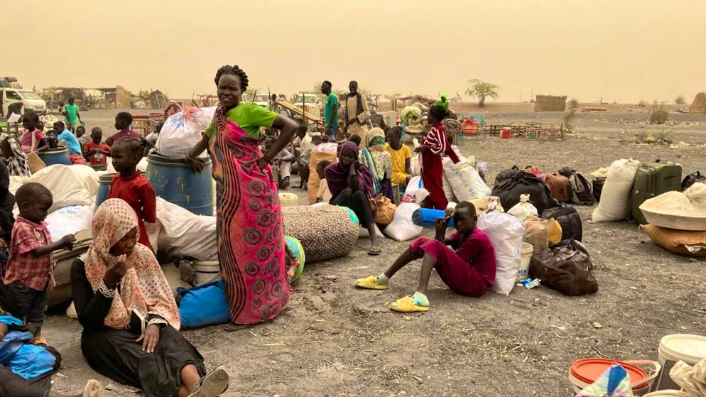 ARCHIVE - Refugees from Sudan wait to be transported to the transit camp in the town of Renk near the border after crossing the border into South Sudan. The bloody power struggle in Sudan, which began in April 2023, has triggered the largest refugee movement in the world. Photo: Eva-Maria Krafczyk/dpa