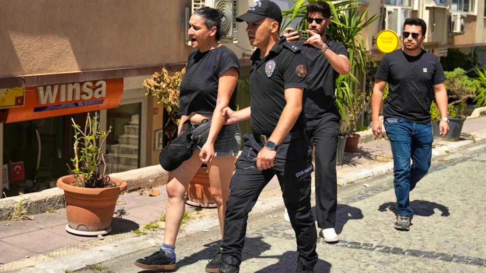 A person is arrested by Turkish police officers during the Pride parade. Photo: Dilara Acikgoz/AP/dpa