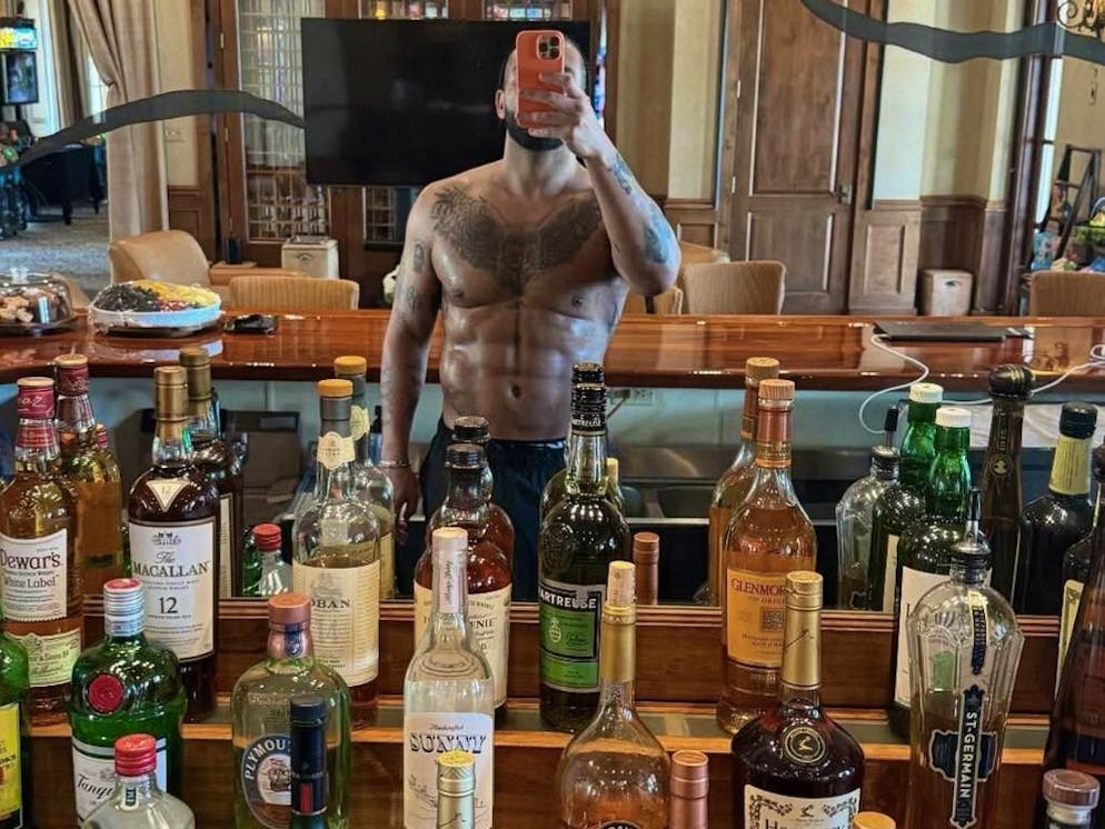 Drake features his abs on Instagram.