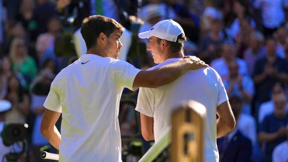 Praise for a strong performance: Oliver Tarvet (right) put up a good fight against defending champion Carlos Alcaraz