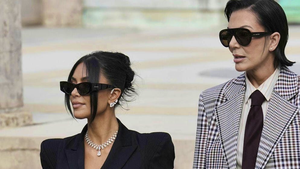 Debut after the facelift: From a distance, Kris Jenner (right) hardly looks older than daughter Kim in Paris in May.