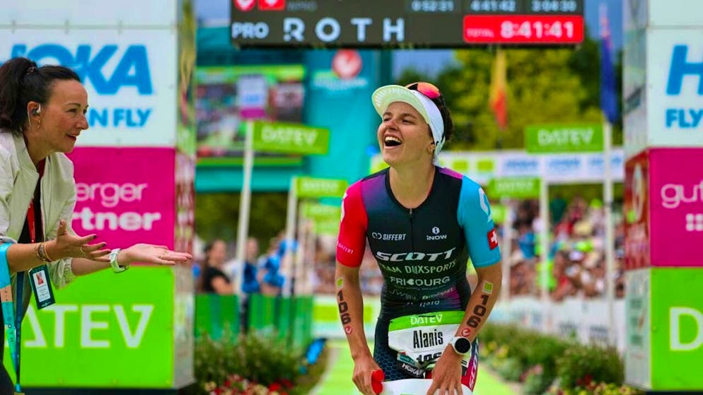 Swiss triathlete Alanis Siffert celebrates 3rd place at Challenge Roth.