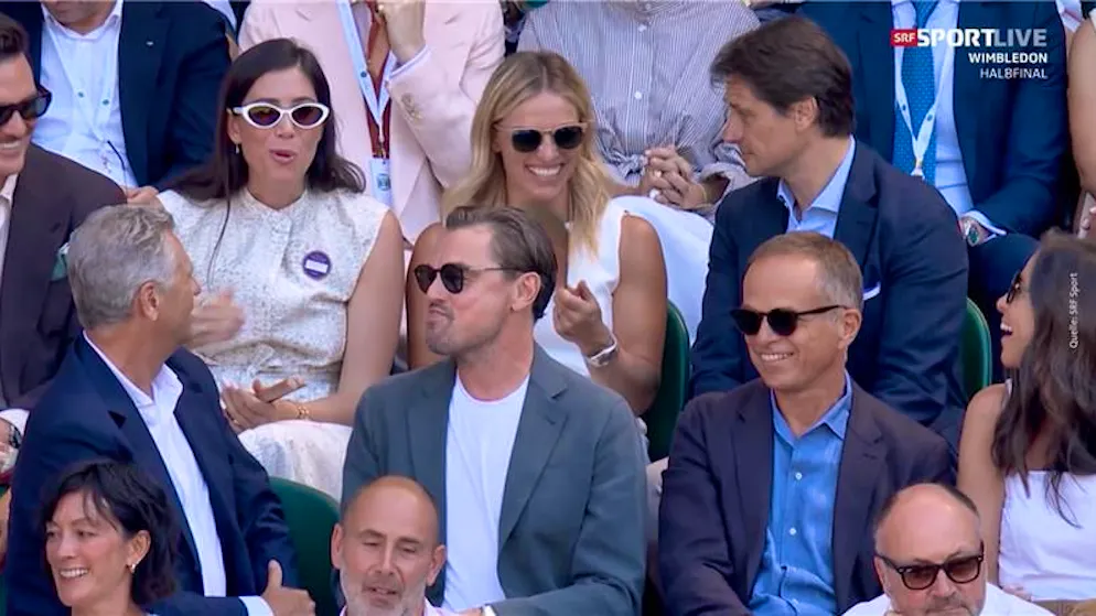 Tennis tournament at Wimbledon. Style, set, match - Lara Gut-Behrami shakes Leonardo DiCaprio's hand here