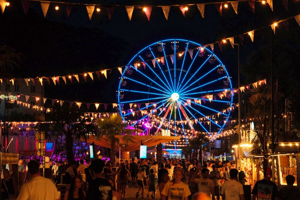 M&S title gallery. A sea of lights illuminates Locarno.