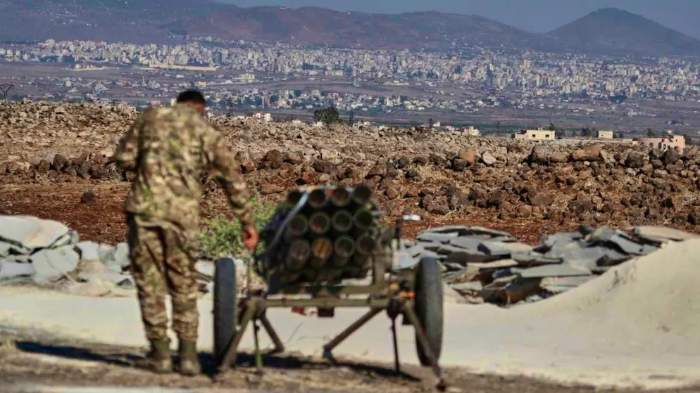 A Syrian government soldier sets up a rocket launcher on the outskirts of the town of Sweida. Photo: Omar Sanadiki/AP/dpa