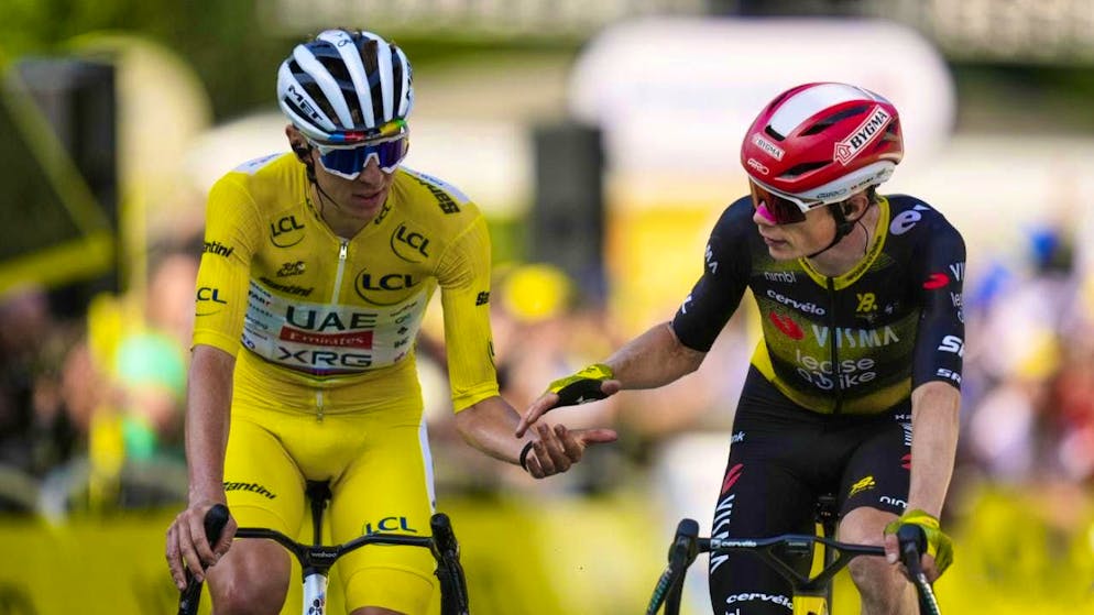 They crossed the finish line together on Monday - and exchanged a brief but meaningful handshake: Tadej Pogacar and Jonas Vingegaard