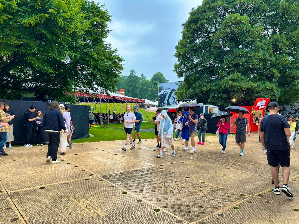 Rain Gurtenfestival. There are also plenty of umbrellas.
