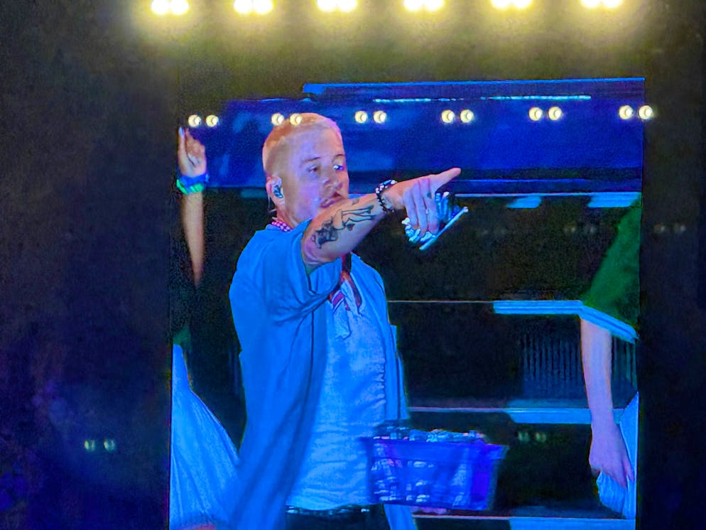Macklemore with a Capri-Sun in his hand.