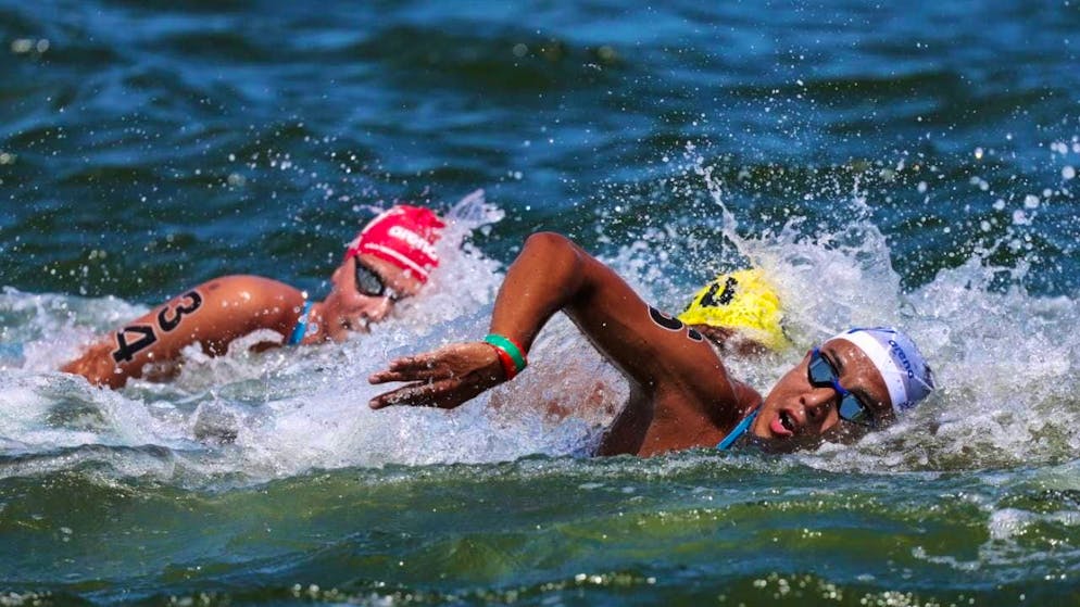The Swiss long-distance swimmers Paul Niederberger and Christian Schreiber (with red swimming cap) surprised positively at the World Championships in Singapore