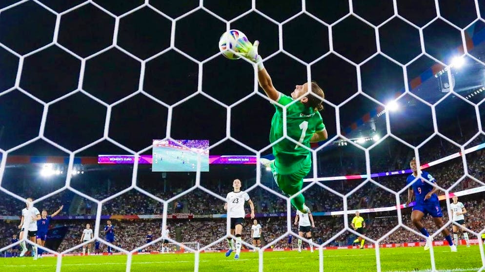 Germany goalkeeper Ann-Katrin Berger successfully stretches herself