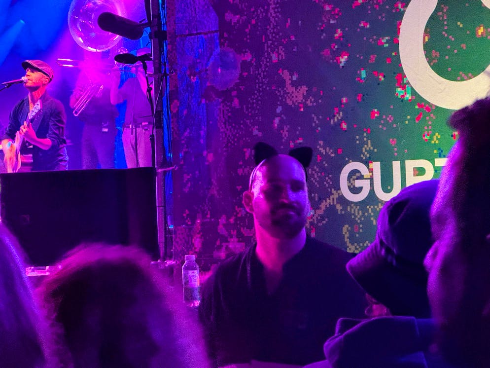 Here a security guard wears black ears.