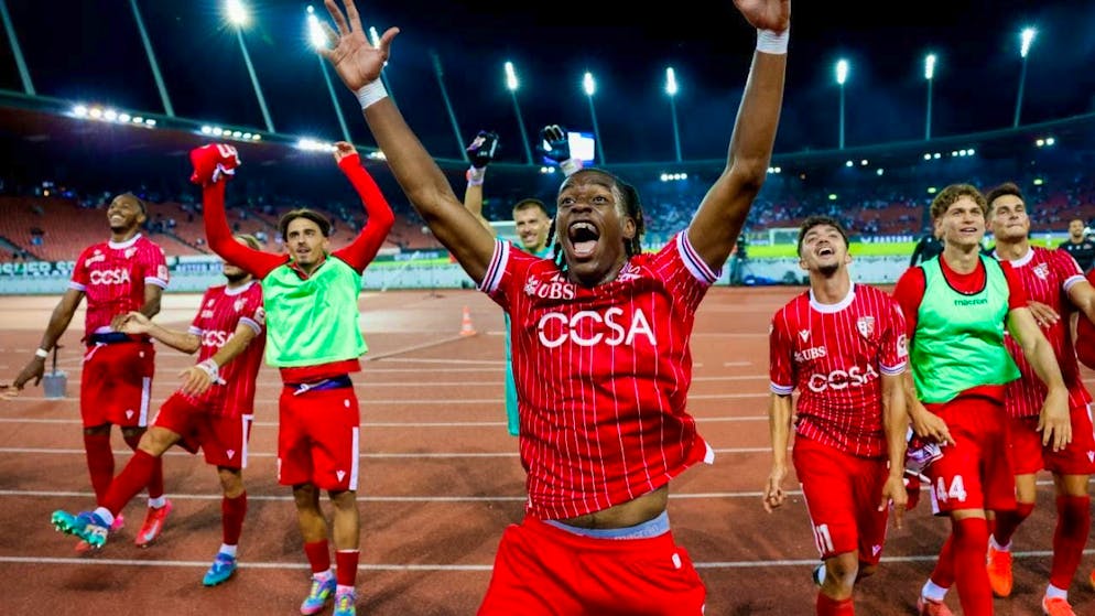 The FC Sion players celebrate an away win that they hardly thought possible
