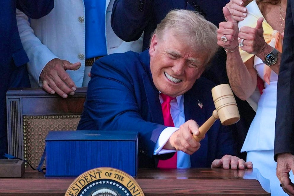 US President Donald Trump bangs the gavel after signing the so-called "One Big Beautiful Bill Act" on July 4, 2025.
