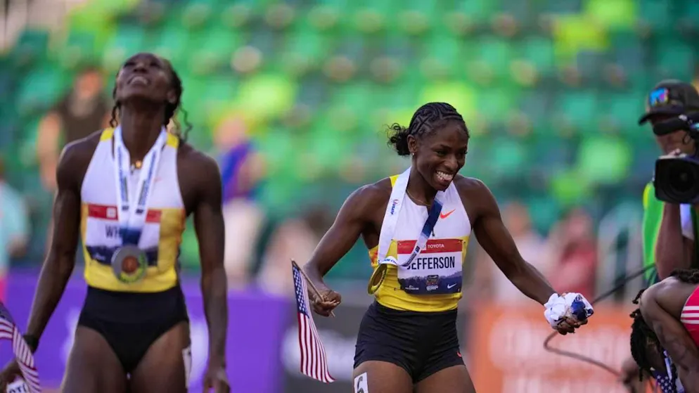Melissa Jefferson-Wooden is delighted to win the 100 m title at the US Trials in Eugene and improve her world best time for the year