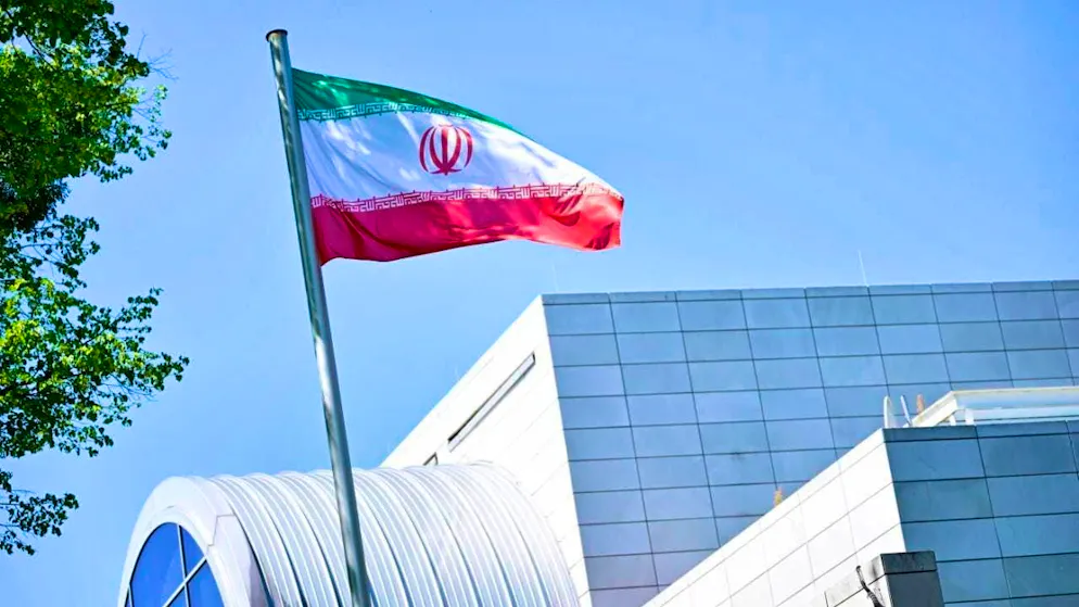 ARCHIVE - The Iranian flag flies in front of the Embassy of the Islamic Republic of Iran in Berlin. Photo: Fabian Sommer/dpa