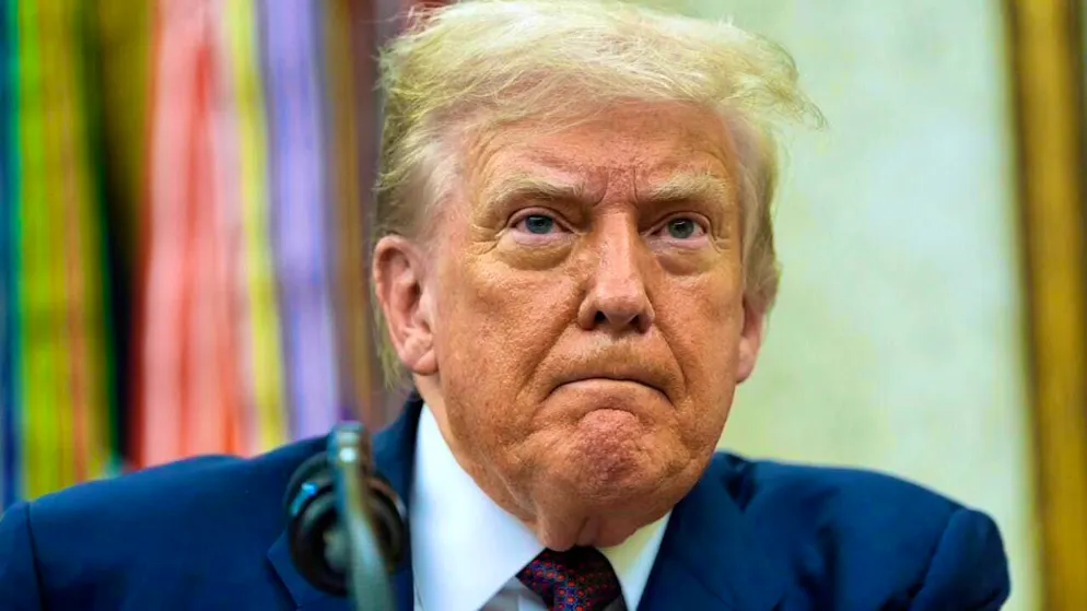 US President Donald Trump makes an announcement in the Oval Office. Photo: Alex Brandon/AP/dpa