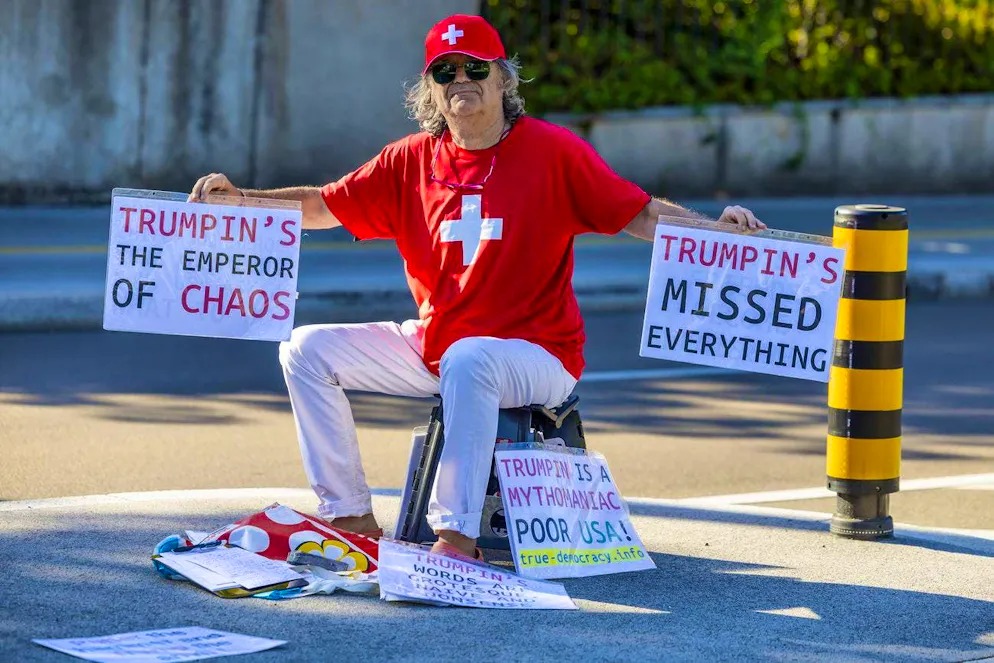 The Swiss Jo protests against Trump's tariffs in front of a United Nations building in Geneva on August 7.