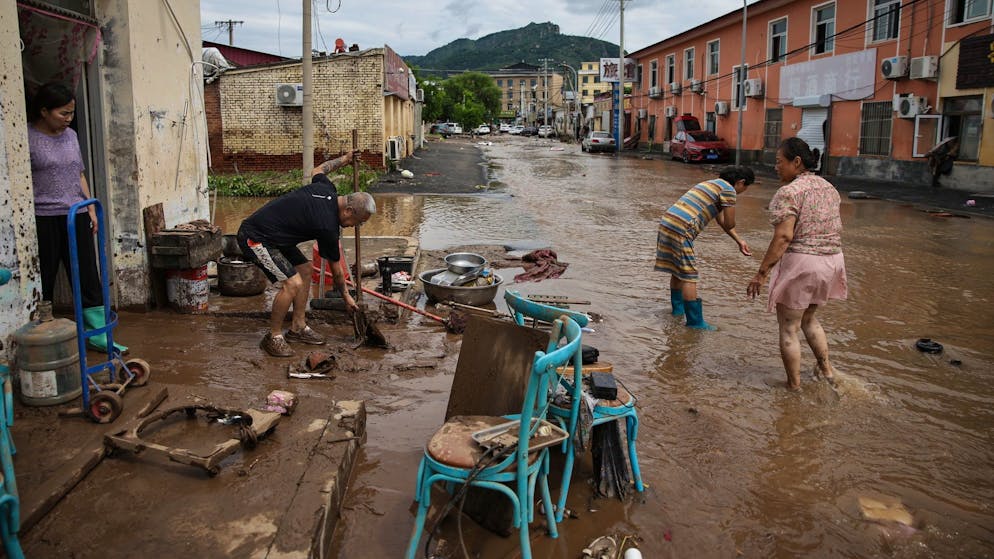 31 dead after flooding. China evacuates 16,000 people due to flooding, but forgets nursing home