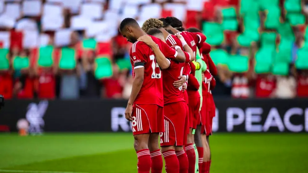 Liverpool win thanks to wild card Chiesa - Gallery. A minute's silence was held at Anfield before the opening game