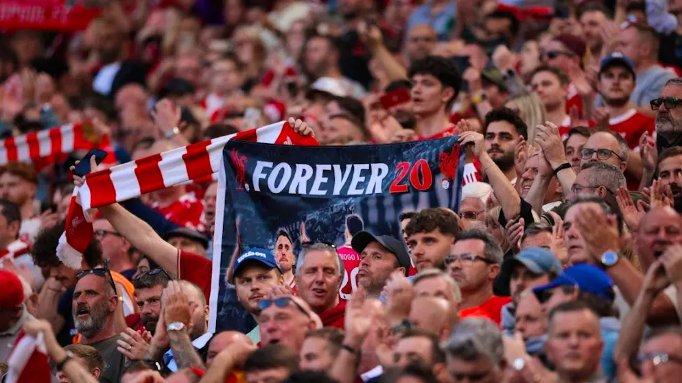 Liverpool win thanks to wild card Chiesa - Gallery. Numerous scarves, flags and banners with pictures and dedications to the two were on display