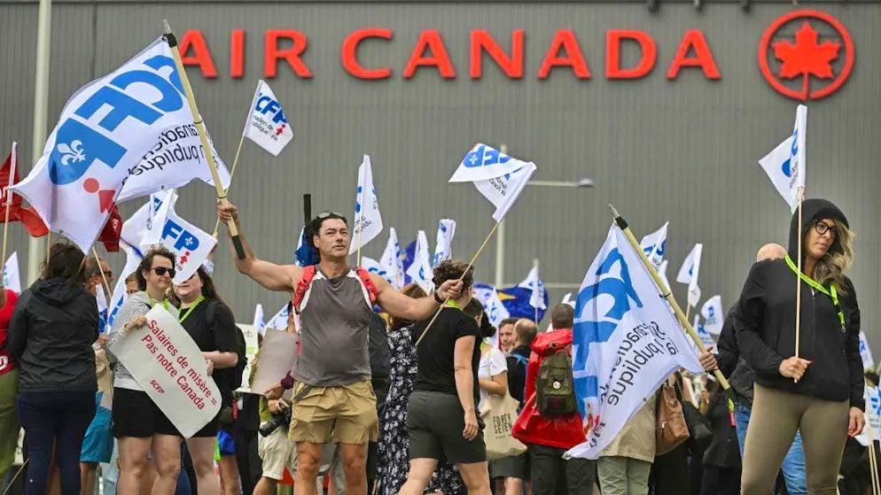 Demonstrators in front of the Air Canada headquarters in Montreal on Sunday during their protest in the wage dispute.
