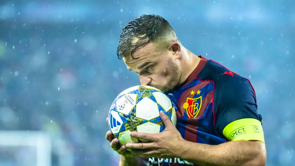 Basel only draw first leg of play-off tie - Gallery. Basel captain Xherdan Shaqiri kisses the ball before scoring from the penalty spot for a 1-0 lead