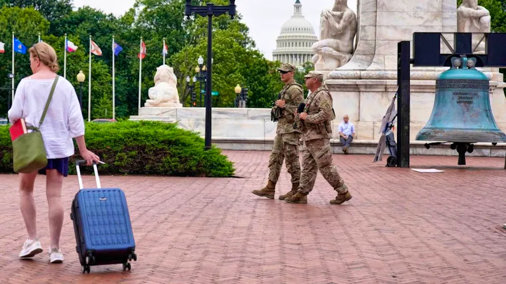 National Guard soldiers stand guard near the Capitol in Washington. Photo: Mariam Zuhaib/AP/dpa