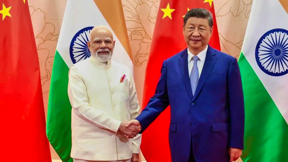 HANDOUT - Indian Prime Minister Narendra Modi (left) and Chinese President Xi Jinping in Tianjin. Photo: Indian Prime Minister's Office/AP/dpa - ATTENTION: For editorial use only and only with full attribution of the above credit