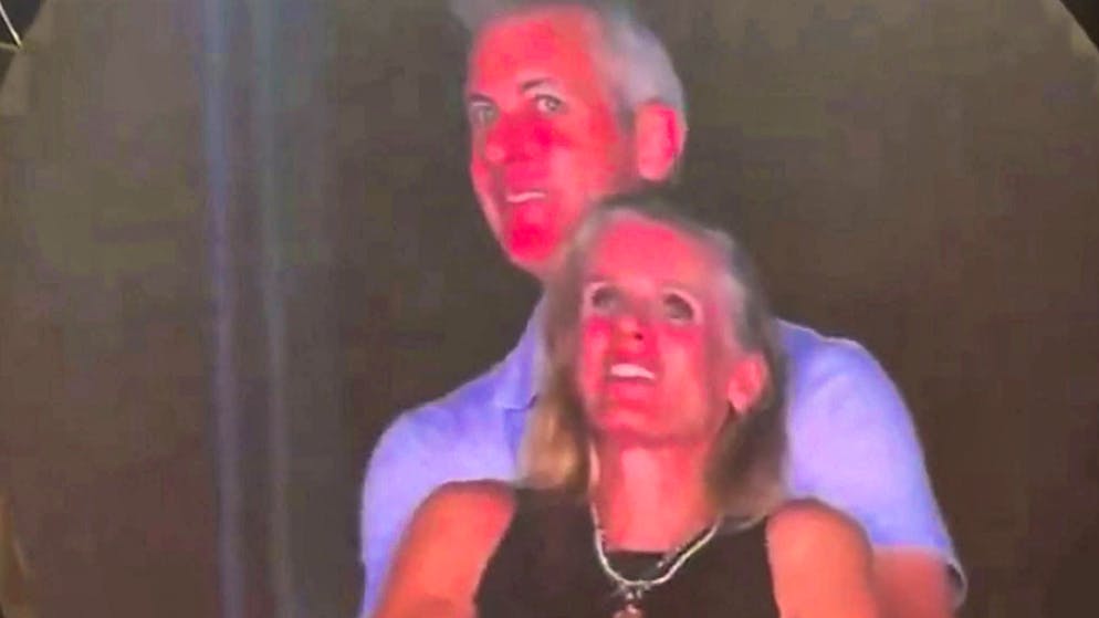 Started it all: the secret couple is caught on a Kiss cam at a Coldplay concert.