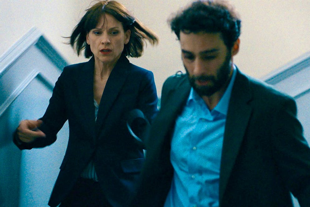 The Deal. Risky rescue attempt: Veerle Baetens as Alexandra Weiss, Arash Marandi as Payam Sanjabi.