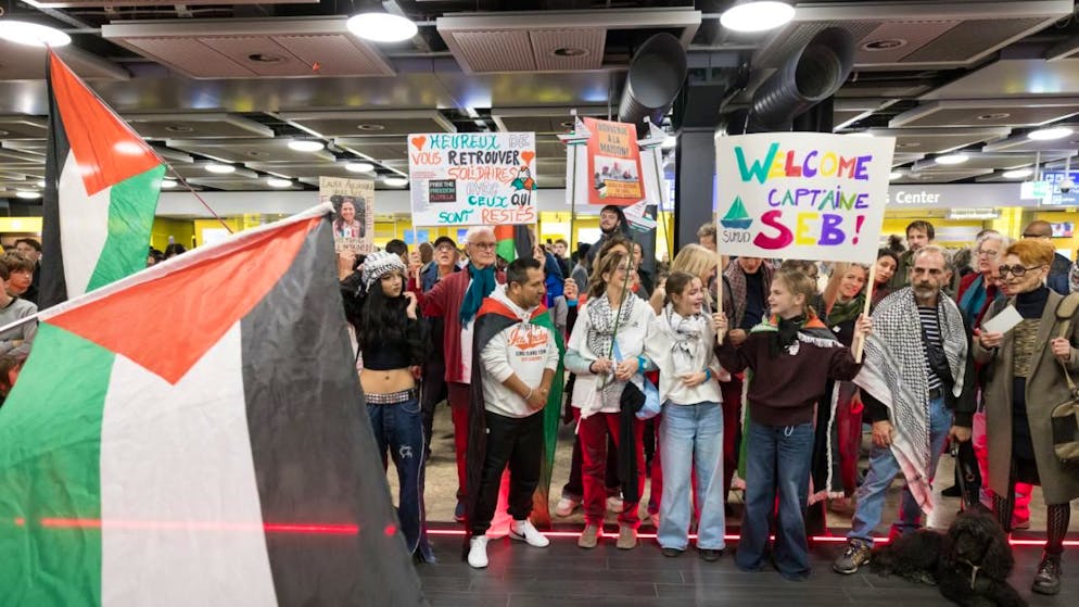 Domenica scorsa otto attivisti erano già arrivati a Ginevra, attesi da un comitato d'accoglienza (nella foto).