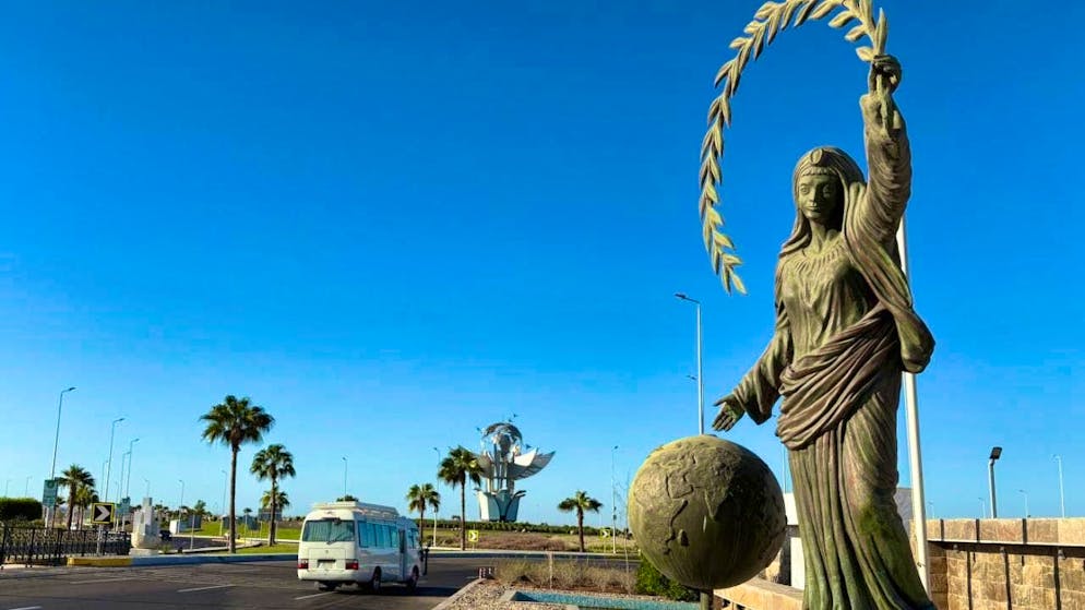 A vehicle drives past the peace square in the Egyptian city of Sharm el-Sheikh on the Red Sea. Photo: Uncredited/AP/dpa