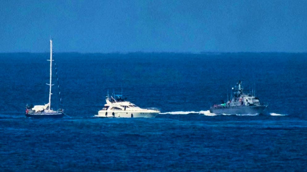 ARCHIVE - Israeli navy ships escort boats from the civilian Gaza flotilla Sumud towards the port of Ashdod after it was intercepted as it approached the Gaza coast. Photo: Leo Correa/AP/dpa