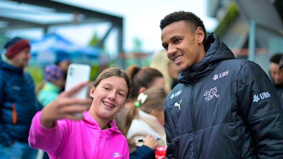 Luca Jaquez poses with fans for the first time as a Swiss senior international