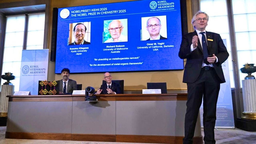On screen as the recipients of the Nobel Prize in Chemistry. Photo: Fredrik Sandberg/TT News Agency/AP/dpa