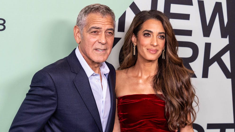 George Clooney con la moglie Amal.