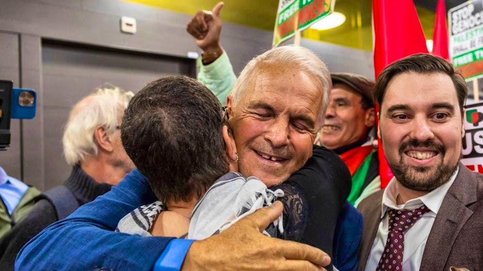 Former Geneva mayor Rémy Pagany (center) and eight other members of the Swiss Gaza flotilla landed in Geneva on Wednesday.