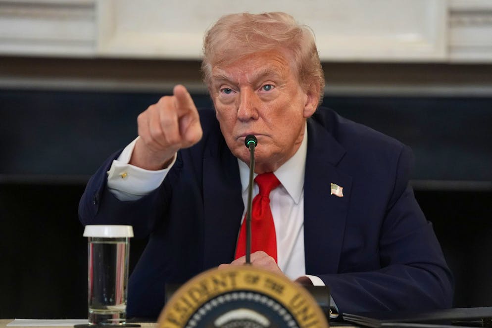 President Donald Trump speaks during a roundtable meeting on antifa in the State Dining Room at the White House, Wednesday, Oct. 8, 2025, in Washington. (AP Photo/Evan Vucci)
