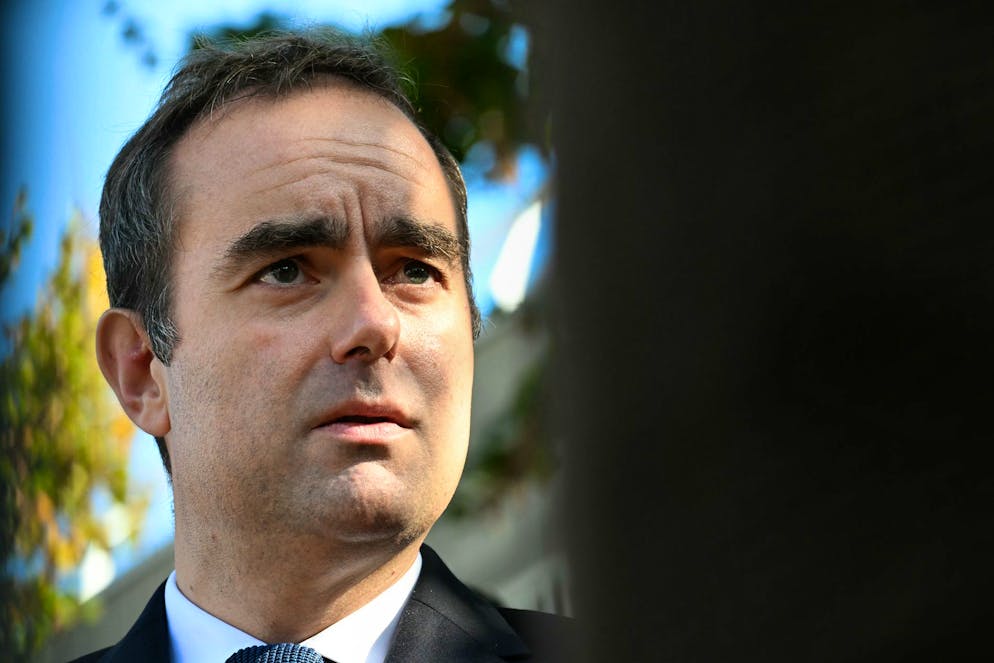 Reappointed French Prime Minister Sebastien Lecornu looks on as he visits a police station in L'Hay-les-Roses, outside Paris, Saturday, Oct. 11, 2025. (Martin Lelievre, Pool Photo via AP)
